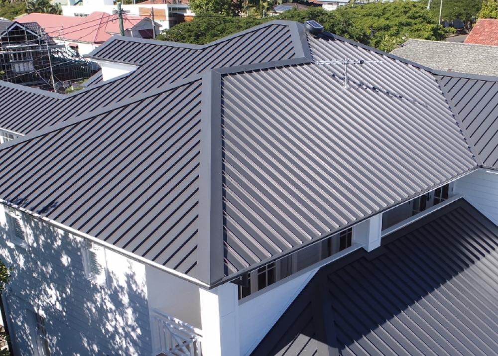 House with ENSEAM steel roofing manufactured from COLORBOND steel in colour Monument