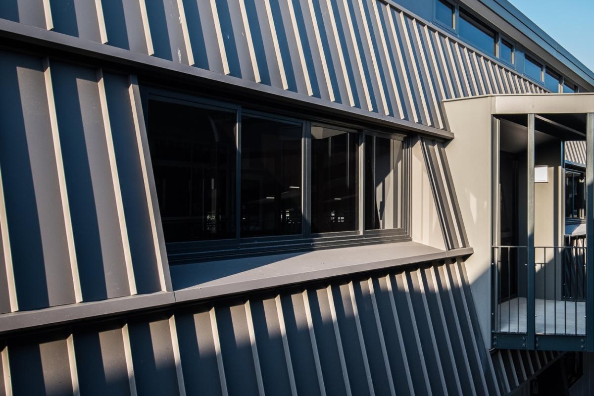 School building with ENSEAM steel walling manufactured from COLORBOND steel in colour Monument