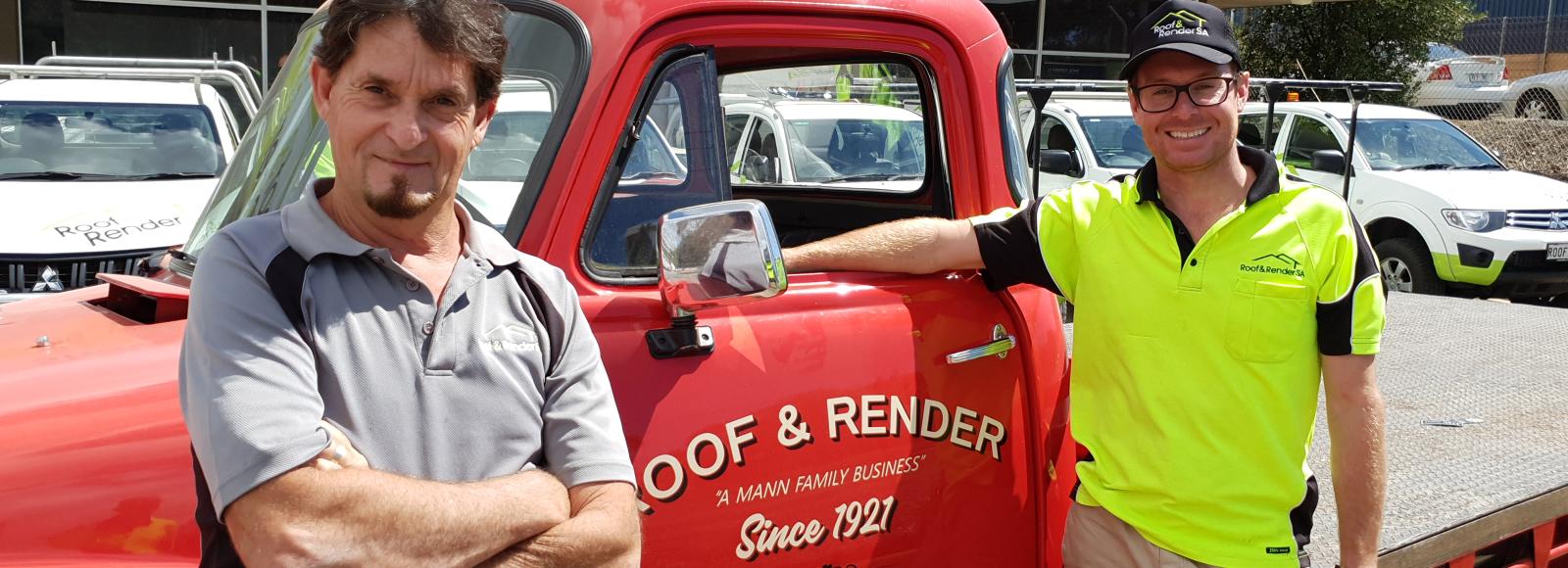 A photo of Ben Mann in front of a bright red classic delivery truck at Roof & Render SA