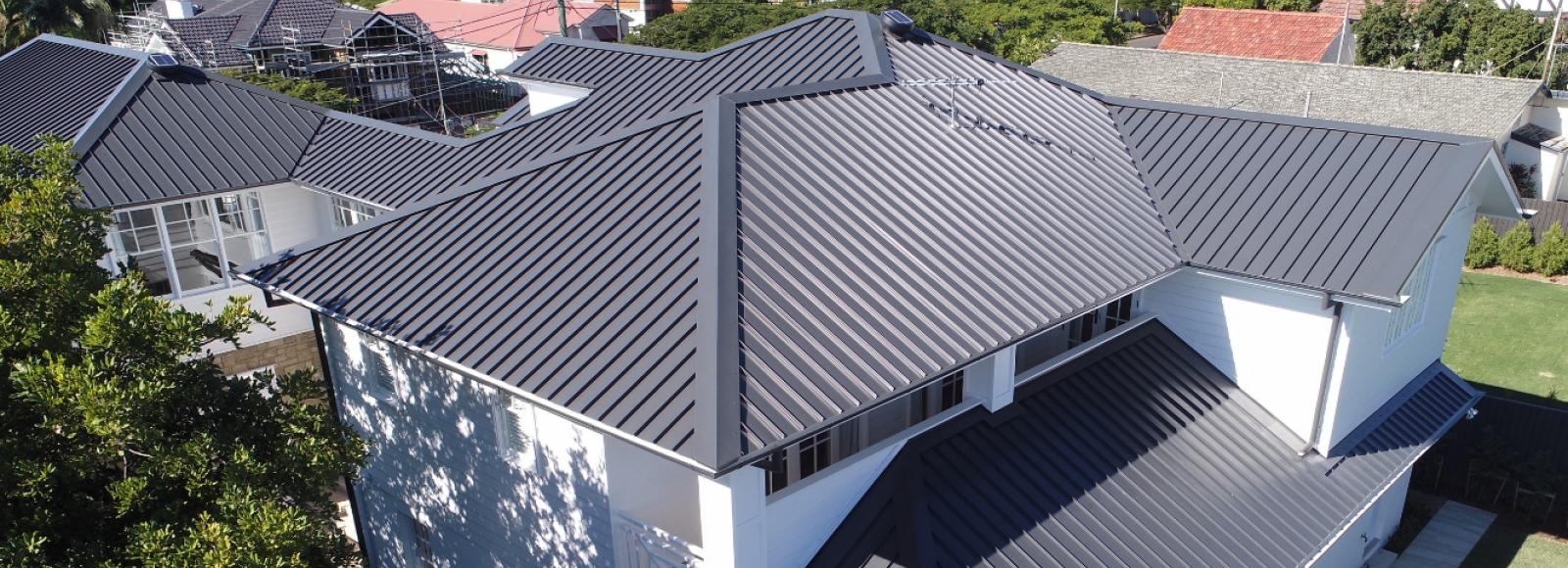 House with ENSEAM steel roofing manufactured from COLORBOND steel in colour Monument