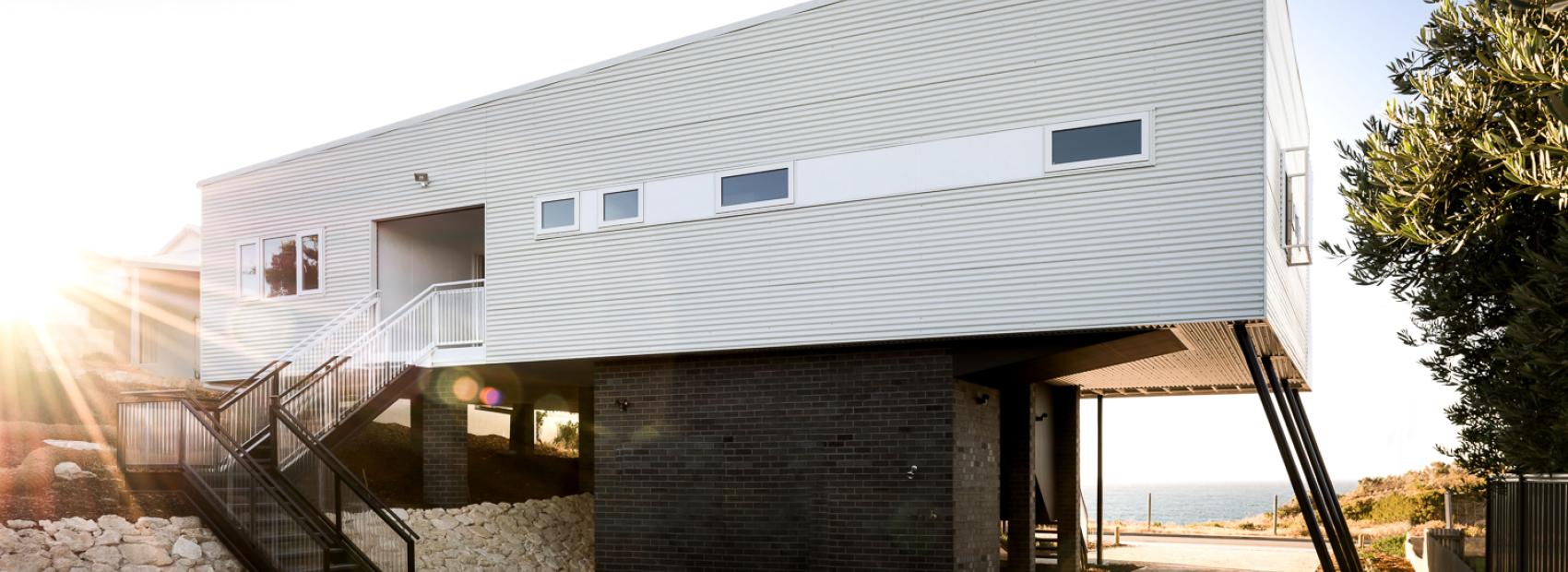 House with CUSTOM ORB steel walling manufactured from COLORBOND steel in colour Surfmist