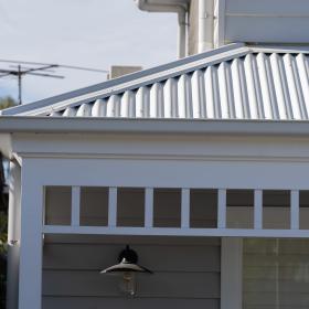Port Noarlunga - Roof & Render with custom orb accent 35 roofing in sufmist