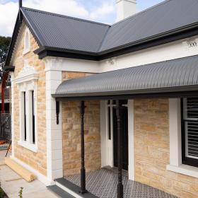  Tribecca Property Group Office with custom orb roofing and ogee gutters in woodland grey