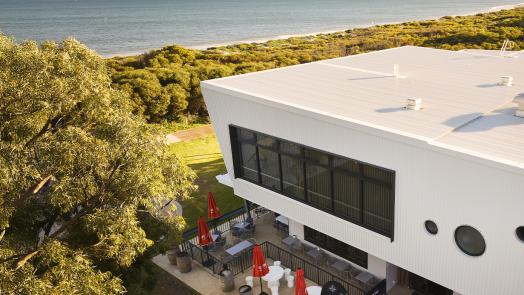 Modern coastal home with Lysaght COLORBOND® Ultra steel roofing in Surfmist®