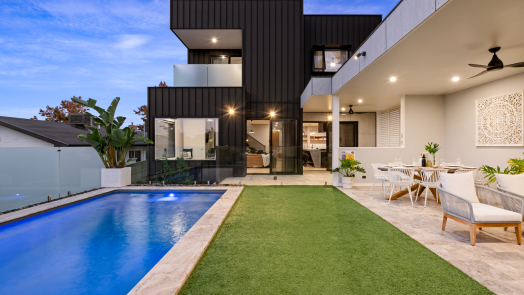 Modern home in Albury which uses Lysaght® product ENSEAM® from the ZENITH Cladding range in Monument®. 