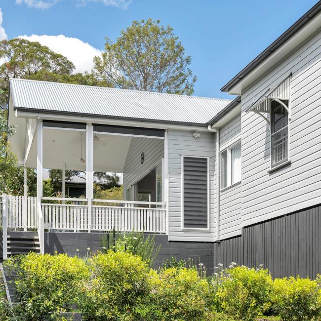 Queenslander House in Wilston QLD with custom orb roofing in zincalume finish