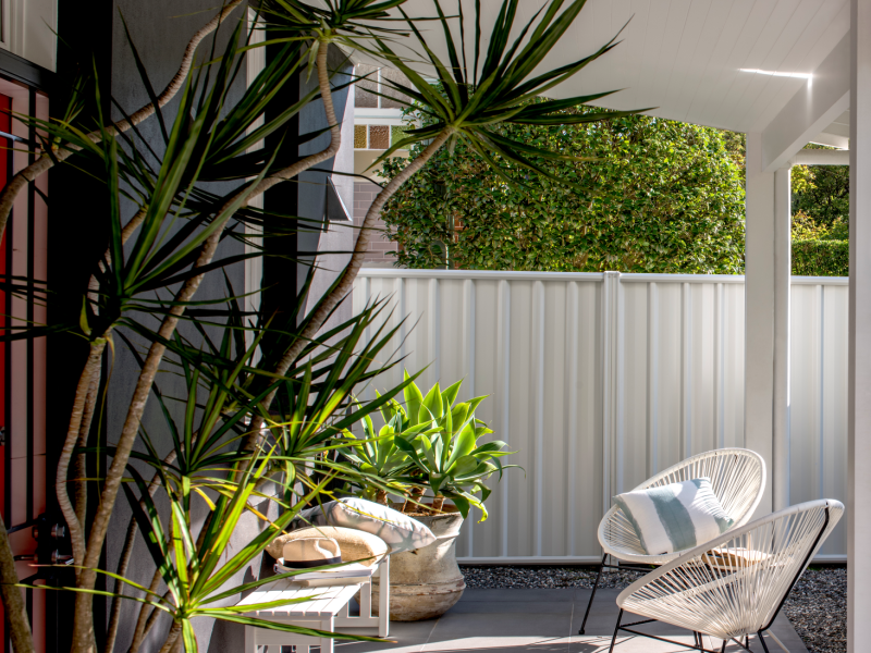 Lysaght fencing within an outdoor landscape scene