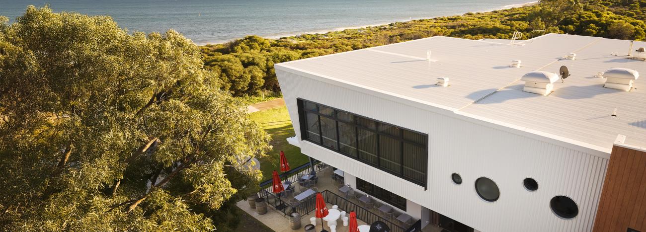 Modern coastal home with Lysaght COLORBOND® Ultra steel roofing in Surfmist®