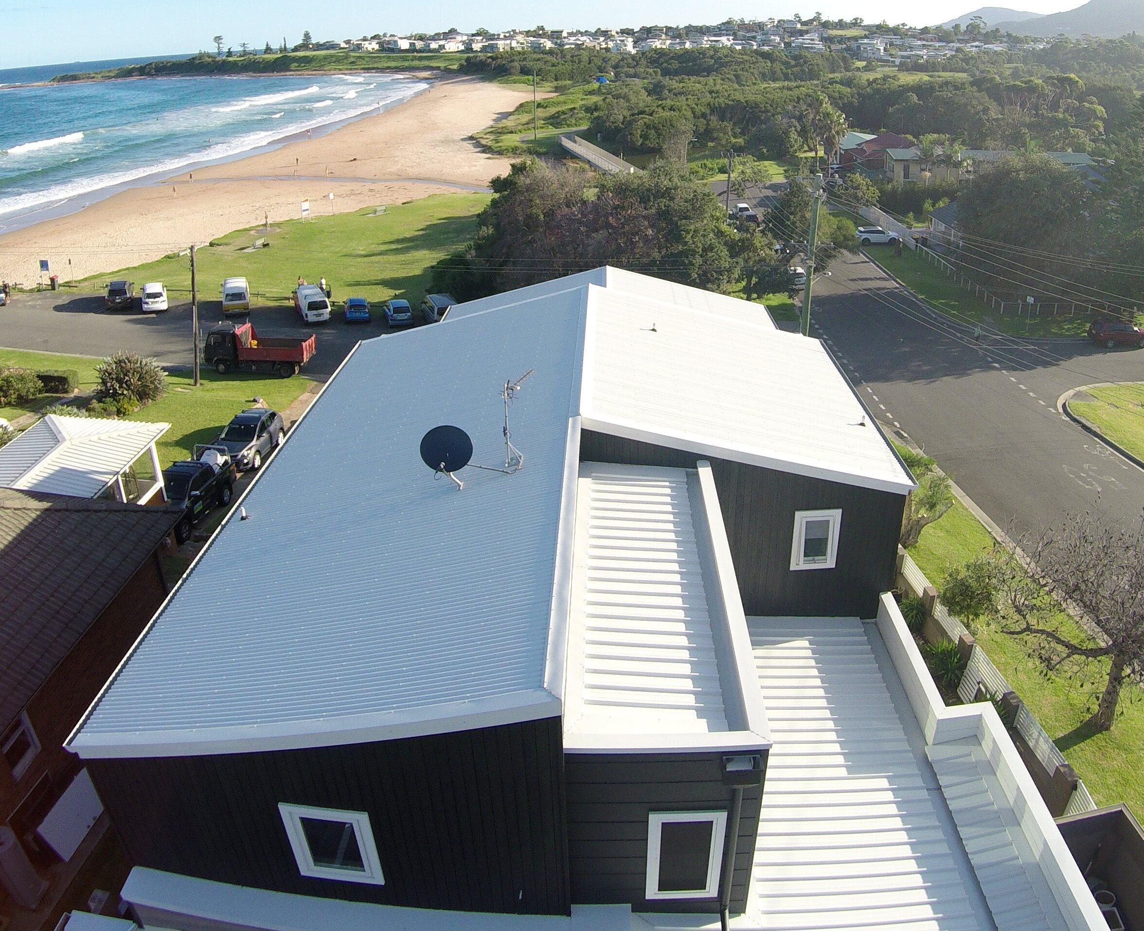 A photo of a home with a LYSAGHT® roof, built overlooking the ocean