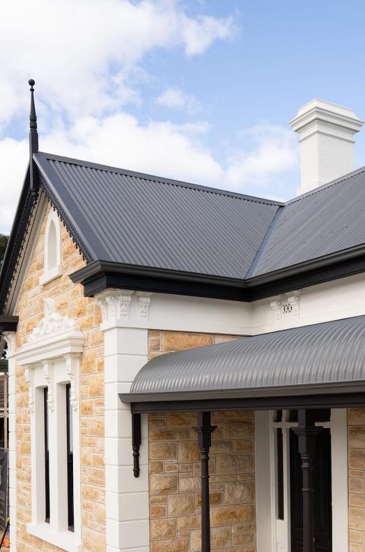Tribecca Property Group Office with custom orb roofing and ogee gutters in woodland grey