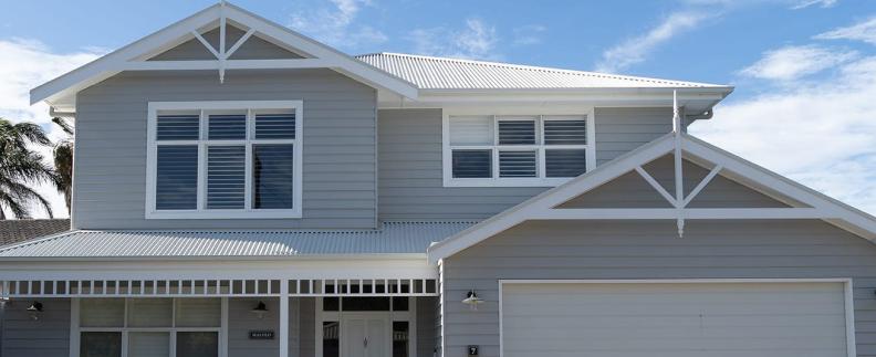 Port Noarlunga - Roof & Render with custom orb accent in surfmist