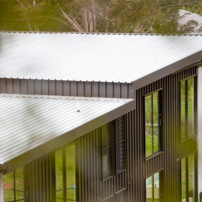 Contemporary home with steel cyclone roofing designed for durability in high wind zones