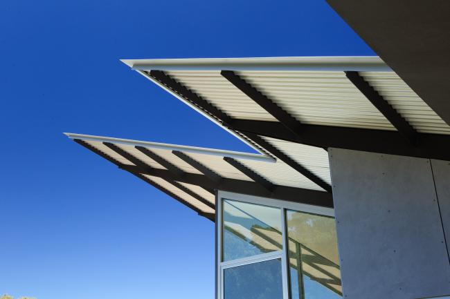 House with CUSTOM ORB steel roofing manufactured from ZINCALUME steel