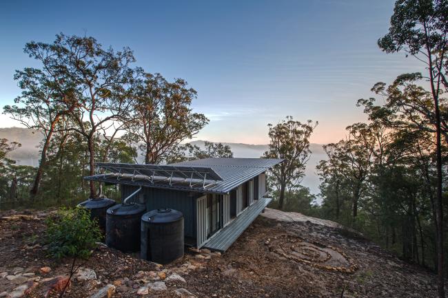 House with KLIP-LOK 700 steel roofing manufactured from COLORBOND steel in colour Ironstone