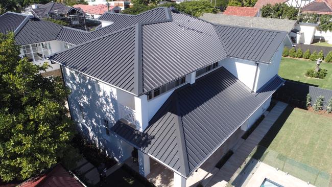 House with ENSEAM steel roofing manufactured from COLORBOND steel in colour Monument