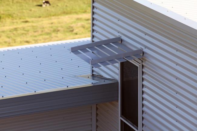 House with CUSTOM ORB steel roofing and walling manufactured from COLORBOND steel in colour Shale Grey