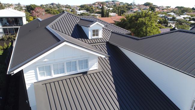 House with ENSEAM steel walling manufactured from COLORBOND steel in colour Monument