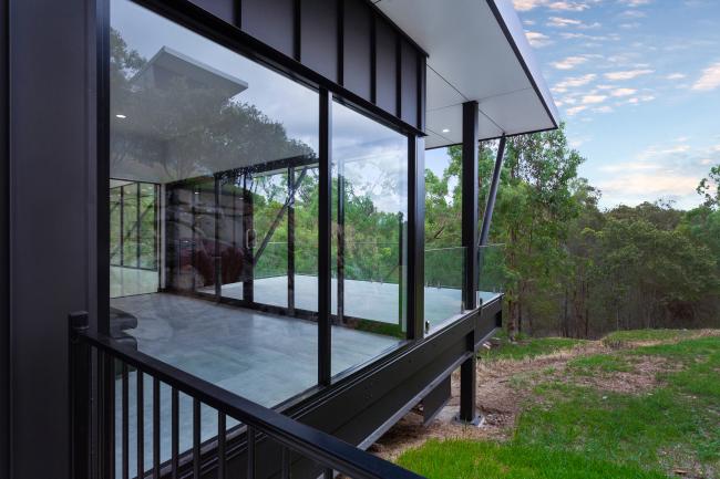 House with ENSEAM steel walling manufactured from COLORBOND steel Matt in colour Monument