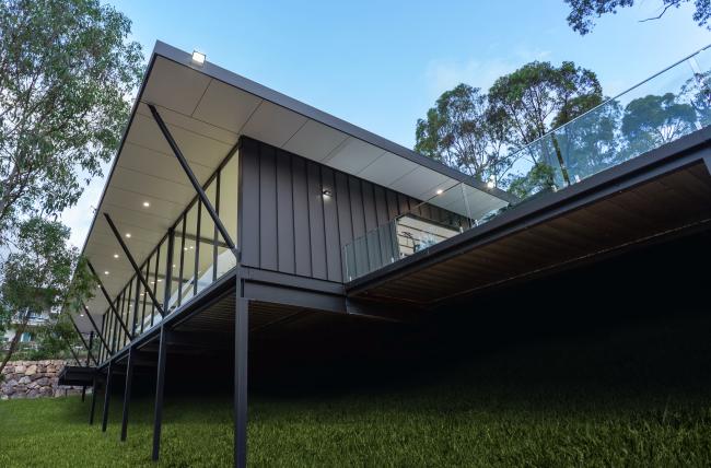 House with ENSEAM steel walling manufactured from COLORBOND steel Matt in colour Monument