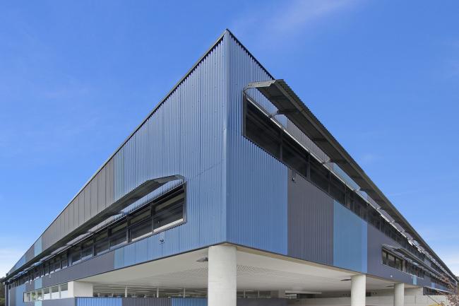 School building with CUSTOM ORB steel walling manufactured from a COLORBOND steel Studio colour