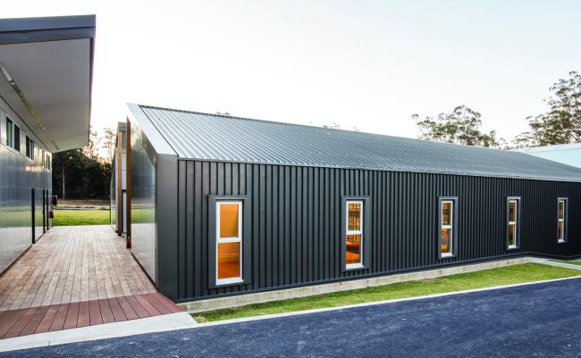 School with LONGLINE 305 walling manufactured from COLORBOND steel in colour Woodland Grey