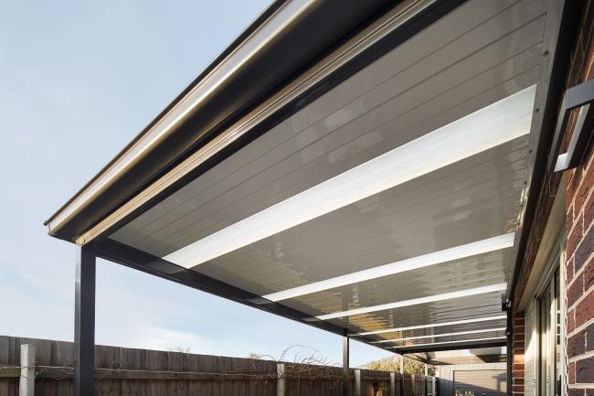 Patio with FLATDEK steel roofing manufactured from COLORBOND steel double-sided in topside colour Surfmist and underside colour Thredbo White