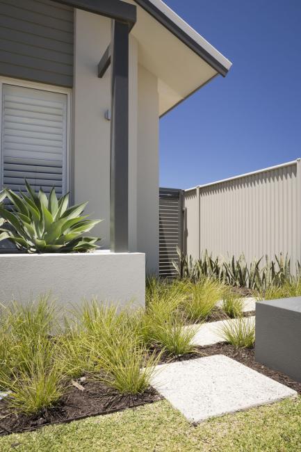 CUSTOMSCREEN fencing made from COLORBOND steel in colour Dune