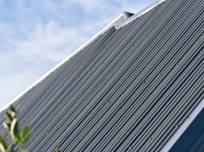 Manningham roofing with custom orb in woodland grey