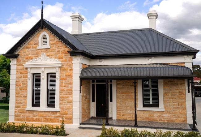 Tribecca Property Group Office with custom orb roofing, ogee gutter in woodland grey